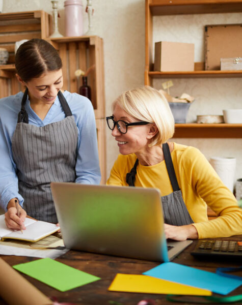 two-women-managing-flower-shop-2023-11-27-04-53-44-utc